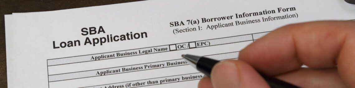 A Small Business Administration aka SBA loan application form, issued by the U.S.A. government, is shown up close.
