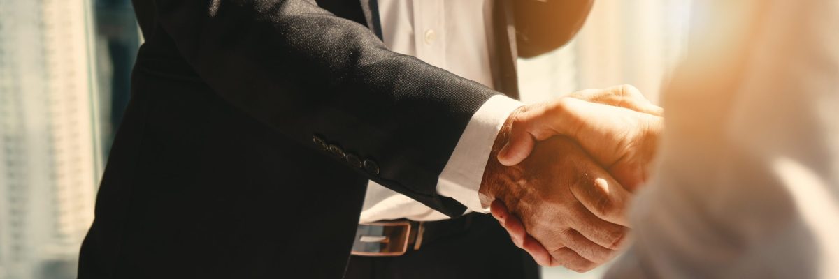 business background of businessman having handshake