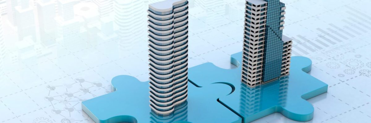 Two company towers on interlocking puzzle pieces illustrating a merger of two businesses