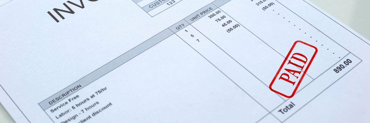 Paid seal stamped on invoice document, business bills, accountancy expense